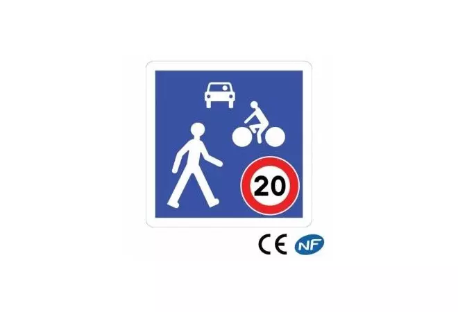 Panneau code de la route indiquant une zone de rencontre entre véhicules et piétons